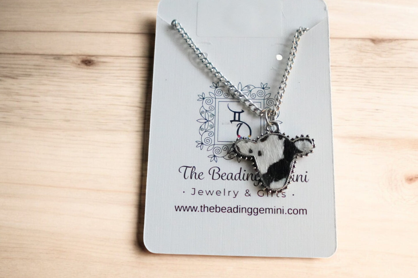 Small Black and White Cow Charm